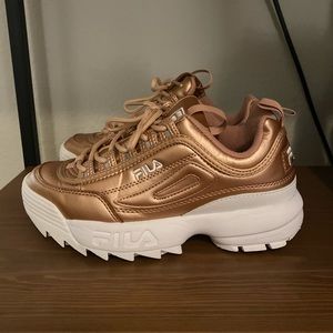 Rose gold FILA tennis shoes